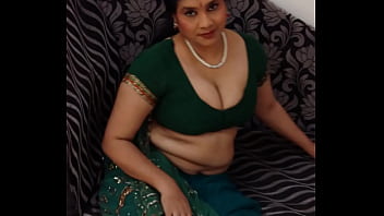Indian woman clothed on couch