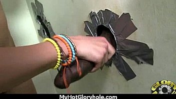Ebony hottie milking cocks in the gloryhole 29