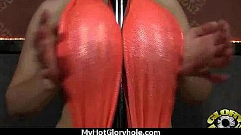 Ebony sucks off a big cock through a gloryhole 19