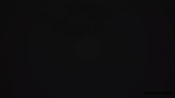 Messy pink lipgloss marks on the car window