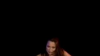 Brunette strips and dance on a guy