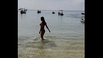 Monika fox poses in pink bikini with stars on beach free