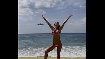 Monika fox poses in pink bikini with stars on beach free