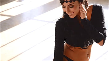 Dancing girl shows off her moves in a black thong