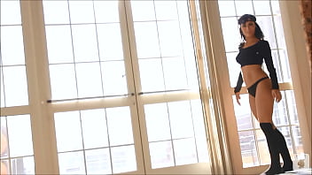 Dancing girl shows off her moves in a black thong