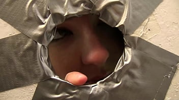 Tattoed girl blowing gloryhole cock