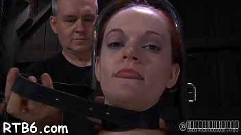 Fastened up babe waits lustily