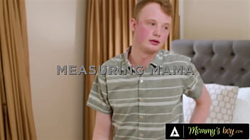 Stepson gets horny while measuring her stepmom big tits