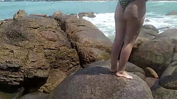 Woman with the big ass in a bikini