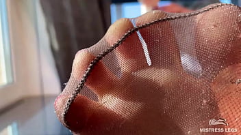 Smelly nylon feet in front of your face teasing you Smelly nylon feet in front of your face teasing you