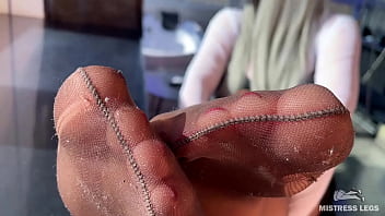 Smelly nylon feet in front of your face teasing you Smelly nylon feet in front of your face teasing you