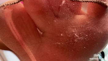 Smelly nylon feet in front of your face teasing you Smelly nylon feet in front of your face teasing you