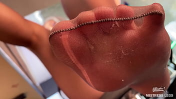 Smelly nylon feet in front of your face teasing you Smelly nylon feet in front of your face teasing you