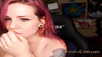 Nerdy pink haired girl loves chatting with viewers