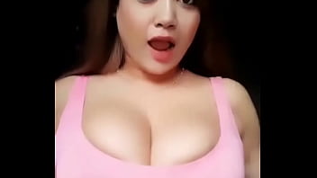 Girl with busty breast dances