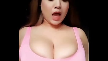 Girl with busty breast dances