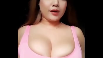 Girl with busty breast dances
