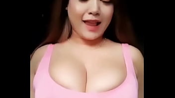 Girl with busty breast dances