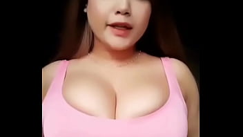 Girl with busty breast dances