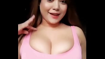 Girl with busty breast dances