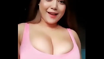 Girl with busty breast dances