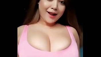Girl with busty breast dances