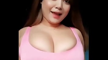 Girl with busty breast dances