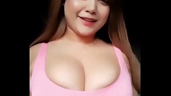 Girl with busty breast dances
