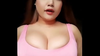 Girl with busty breast dances