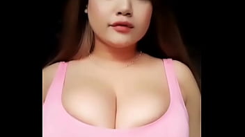 Girl with busty breast dances