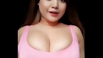 Girl with busty breast dances