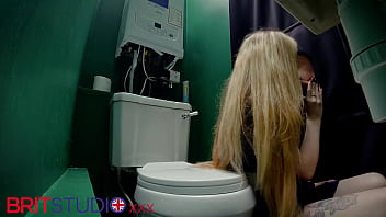 Horny nurse sucks cock at the gloryhole