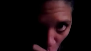 She blows and deepthroats a big purple dildo