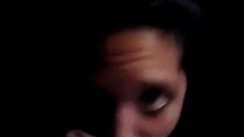 She blows and deepthroats a big purple dildo