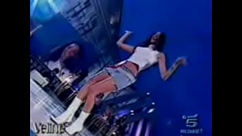 Hot italian beauty shows upskirt as she dances during a performance