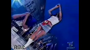 Hot italian beauty shows upskirt as she dances during a performance