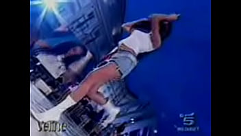 Hot italian beauty shows upskirt as she dances during a performance