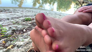 Sex feet teasing in pantyhose outdoor