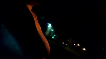 Riding around flashing my boobs at night