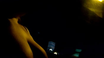 Riding around flashing my boobs at night