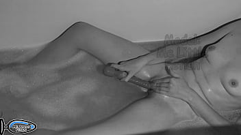 Slender girl takes an evening bath masturbates her pussy with a vibrator and gets an orgasm