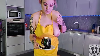 Chubby waitress masturbates in the kitchen wearing an apron