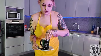 Chubby waitress masturbates in the kitchen wearing an apron