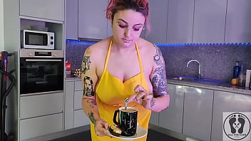 Chubby waitress masturbates in the kitchen wearing an apron