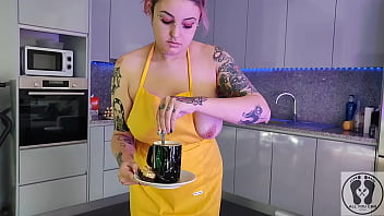 Chubby waitress masturbates in the kitchen wearing an apron