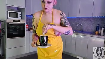 Chubby waitress masturbates in the kitchen wearing an apron