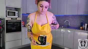 Chubby waitress masturbates in the kitchen wearing an apron