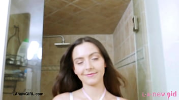 Stunning brunette beauty enjoys a sensual bath