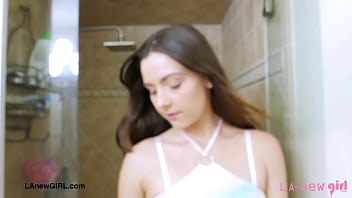 Stunning brunette beauty enjoys a sensual bath