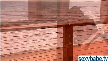 Blonde at the beach with big titties